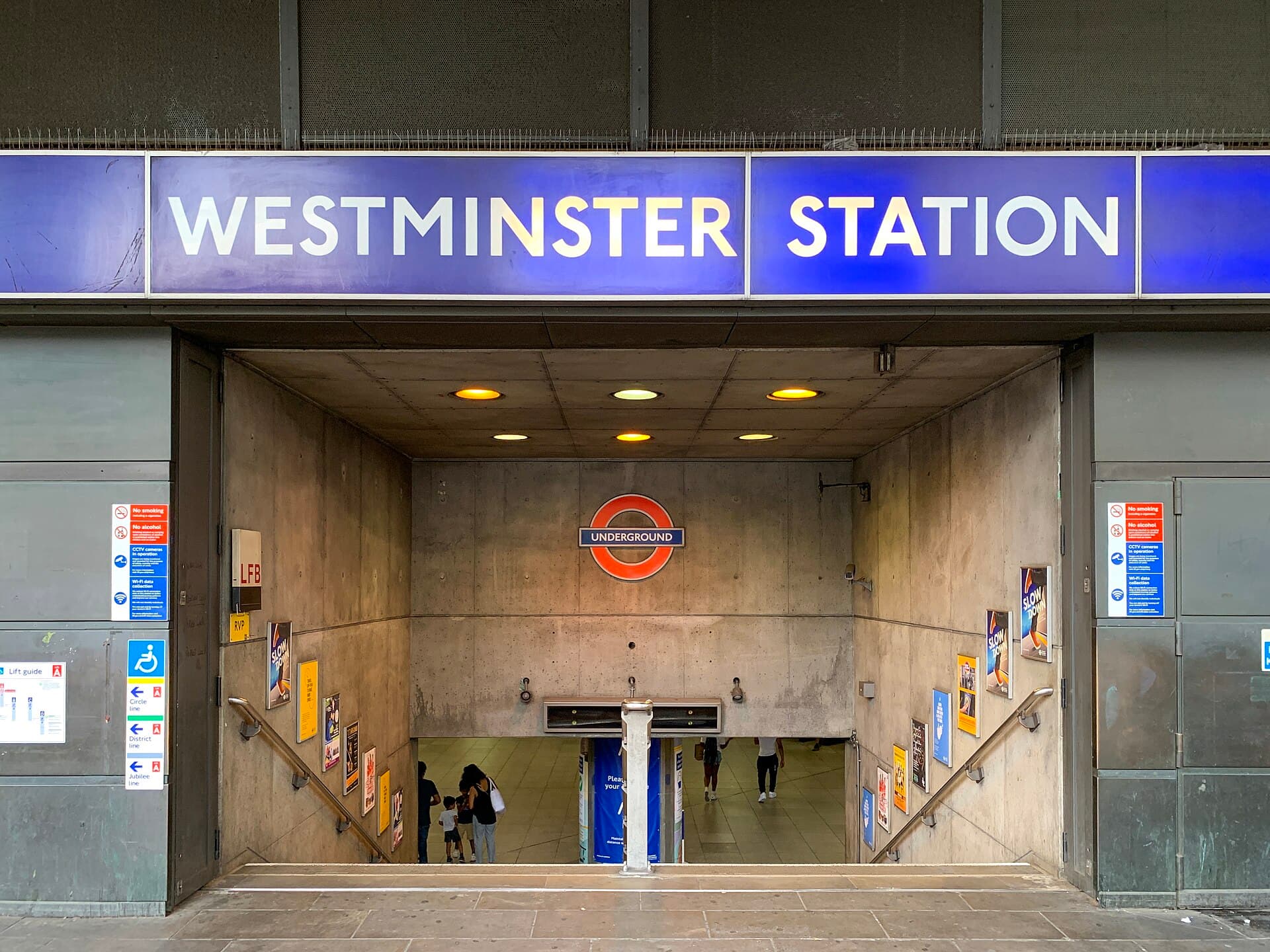 Westminster Underground station entrance — connectivity and city-scale delivery